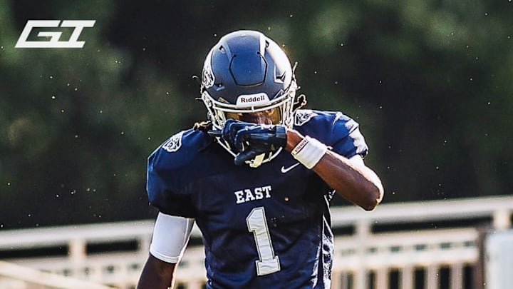 Receiver JP Gilchrist caught 8 passes for 158 yard and three touchdowns in East Forsyth's 49-14 rout of A.C. Reynolds.