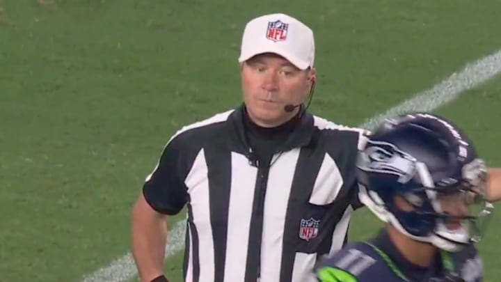 An NFL referee wasn't pleased with Seahawks WR Jaxon Smith-Njigba after his reaction to a holding penalty