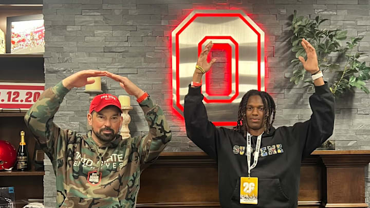 Havon Finney Jr. with Ohio State coach Ryan Day