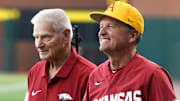 Former Arkansas Razorbacks coach Norm DeBriyn and current coach Dave Van Horn at the game against Missouri State on April 30, 2024, at Baum-Walker Stadium.