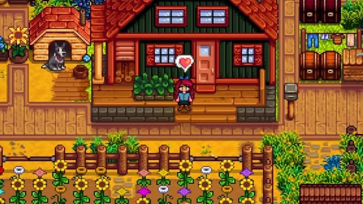 A farmer standing outside their farmhouse with a field of flowers in front of them and a dog in a doghouse  next to it.