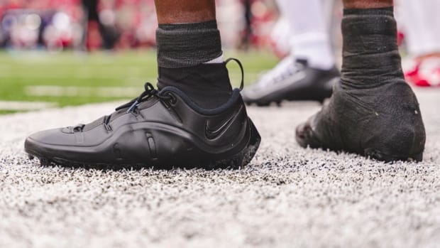 Marvin Harrison Jr. wears black Nike cleats.