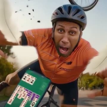 An AI version of Stephen A. Smith tried to play Solitaire Cash on a bicycle. 