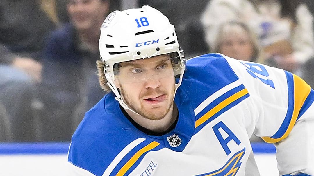 Dec 18, 2025; St. Louis, Missouri, USA; St. Louis Blues center Robert Thomas (18) controls the puck against the New York Rangers during the second period at Enterprise Center. Mandatory Credit: Jeff Curry-Imagn Images