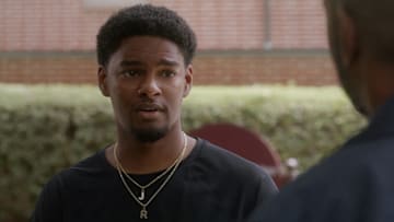 All American: Homecoming -- "We Need A Resolution" -- Image Number: AHC201fg_0r.jpg -- Pictured: Sylvester Powell as JR -- Photo: Troy Harvey/The CW -- (C) 2022 The CW Network, LLC. All Rights Reserved.
