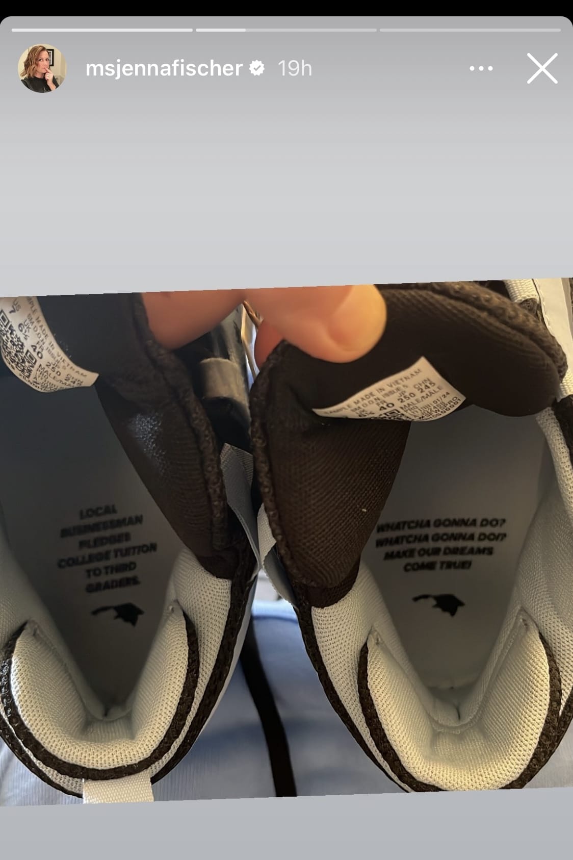 Jenna Fischer's blue adidas sneakers.