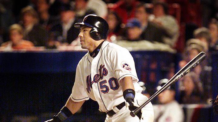 Oct 24, 2000; New York, NY, USA; Mets Benny Agbayani watches his game-winning RBI double in the eighth inning of the third game of the World Series at Shea Stadium in New York.  Mandatory Credit: Eileen Blass/USA TODAY-USA TODAY NETWORK
