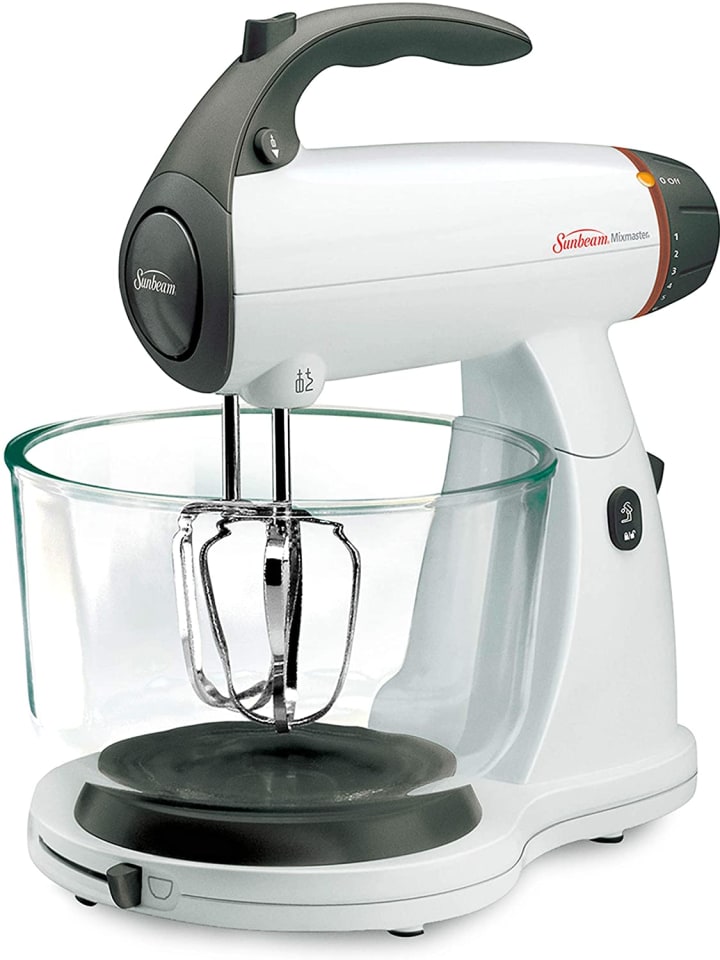 Sunbeam stand mixer in white against a white background.