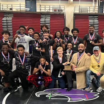 The Obama Academy wrestling team won its second consecutive City League championship by edging out Taylor Allderdice by a half point last weekend.