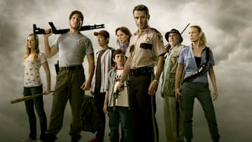 Amy (Emma Bell), Shane Walsh (Jon Bernthal), Glenn (Steven Yeun), Carl Grimes (Chandler Riggs), Lori Grimes (Sarah Wayne Callies), Rick Grimes (Andrew Lincoln), Dale (Jeffrey DeMunn) and Andrea (Laurie Holden) - The Walking Dead - Season 1 - Photo Credit: Matthew Welch / AMC