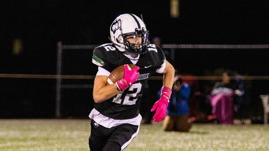 Chase Courtemanche brings the ball upfield. Chase Courtemanche brings the ball upfield.