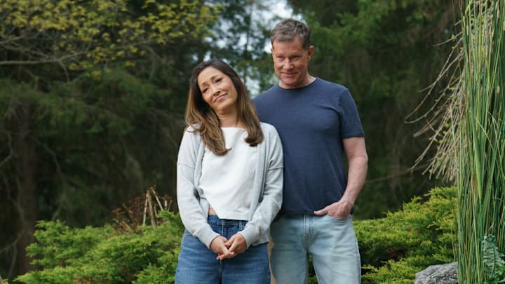 Christina Chang as Yuna Hollander and Dylan Walsh as David Hollander in Heated Rivalry