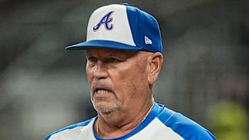  Atlanta Braves manager Brian Snitker (43) walks to the mound to change pitchers against the New York Mets during the seventh inning at Truist Park.