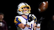 Olentangy's Kaden Gebhardt (34) catches a touchdown pass while Dublin Jerome   s Patrick Nally (9) defends during a first-round Division I playoff game Oct. 28