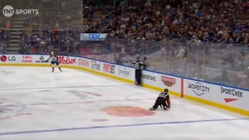 NHL referee Kelly Sutherland sets up a Maple Leafs shorthanded goal after failing to get out of the way of a clearance.