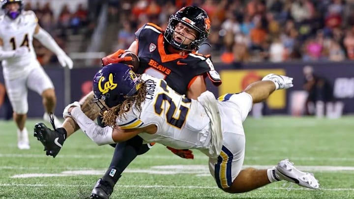 Cal defensive back Isaiah Crosby tackles an Oregon State ball carrier