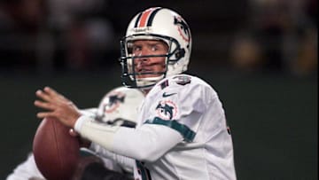 Miami Dolphins QB Dan Marino eyes Stanley Prichett for a short pass against the Jets during the 1999 season.