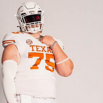 3-star offensive tackle John Mills picked Texas over 15 other schools