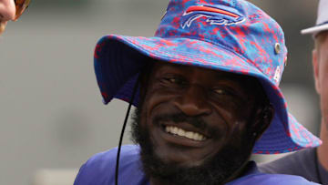 Buffalo Bills cornerback Tre'Davious White comes over to Taylor Lewan and Will Compton.