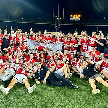 In the first overtime game in MIA lacrosse championship history, Calvert Hall came from behind to knock off Archbishop Spalding, the nation's No. 1 team, 10-9, Friday night at Towson University's Johnny Unitas Stadium.