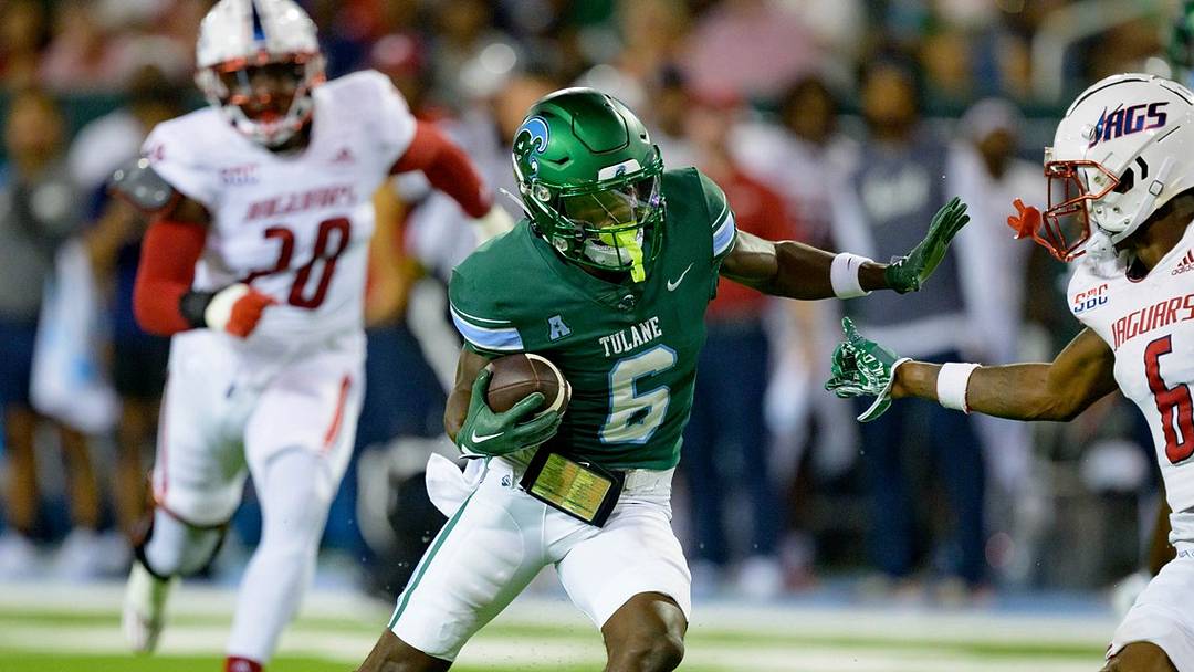 Sept 02, 2023; New Orleans, LA, USA; Former Tulane wide receiver, Lawrence Keys III (6) attempts to stiff arm South Alabama cornerback Ricky Fletcher (6) at Yulman Stadium. Mandatory Credit: Matthew Hinton-AP Sept 02, 2023; New Orleans, LA, USA; Former Tulane wide receiver, Lawrence Keys III (6) attempts to stiff arm South Alabama cornerback Ricky Fletcher (6) at Yulman Stadium. Mandatory Credit: Matthew Hinton-AP