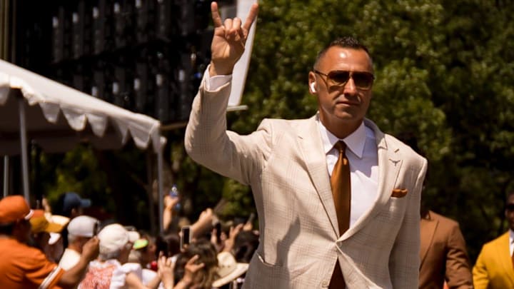 Texas head football coach Steve Sarkisian walks through the Texas team parade before a football game against UTEP. Texas head football coach Steve Sarkisian walks through the Texas team parade before a football game against UTEP.
