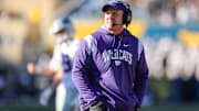 Chris Klieman looks on as he coaches the Kansas State Wildcats.