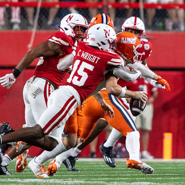  Nebraska defensive back Ceyair Wright sacks Illinois quarterback Luke Altmyer, stripping the ball in the process.
