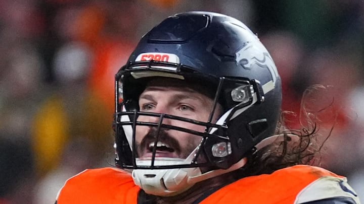 Dec 14, 2025; Denver, Colorado, USA; Denver Broncos linebacker Alex Singleton (49) celebrates defeating the Green Bay Packers during the fourth quarter at Empower Field at Mile High. Mandatory Credit: Ron Chenoy-Imagn Images