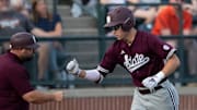 Mississippi State Bulldogs' Ace Reese (3) celebrates his home run against the Auburn Tigers at Plainsman Park in Auburn, Ala.