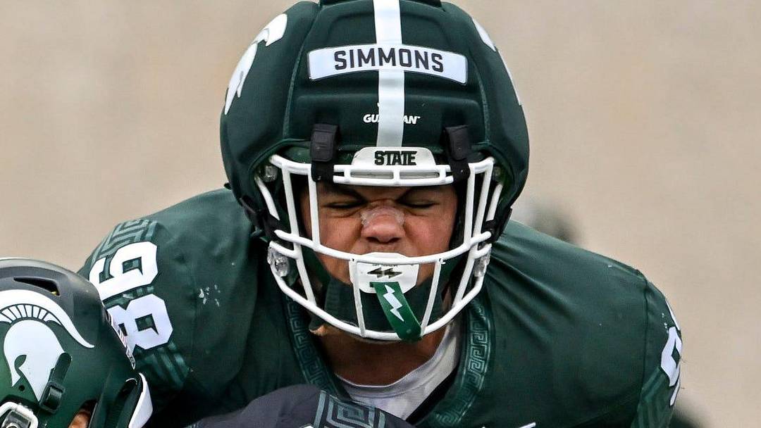 Michigan State's Derrick Simmons, top, stops Cam Fancher during the football Spring Showcase on Saturday, April 18, 2026, at Spartan Stadium in East Lansing.