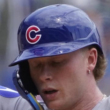 Chicago Cubs outfielder Pete Crow-Armstrong (4) gestures after hitting a double against the Chicago White Sox during the third inning at Rate Field on July 27. 