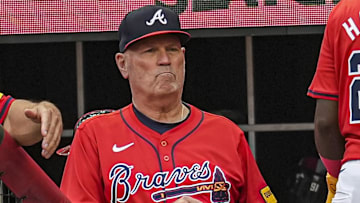 Atlanta Braves center fielder Michael Harris II (23) reacts with manager Brian Snitker (43) after scoring a run against the Oakland Athletics during the second inning at Truist Park.
