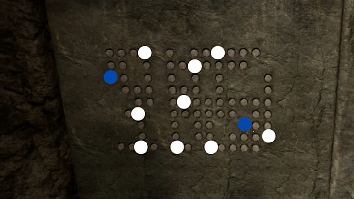The final puzzle in Indiana Jones and the Great Circle with spots to indicate where the relics should be placed.