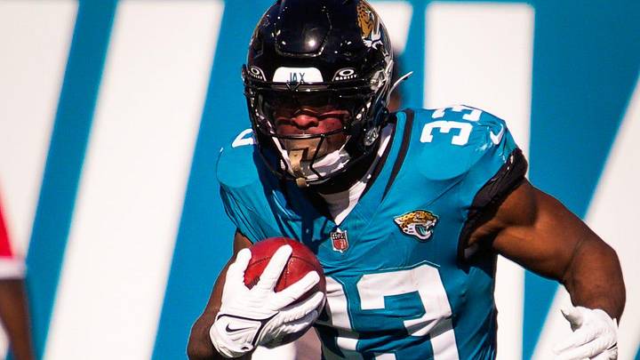 Jacksonville Jaguars running back Bhayshul Tuten (33) returns a kick off in the first quarter during an NFL football game at EverBank Stadium, Sunday, Dec. 14, 2025, in Jacksonville, Fla.