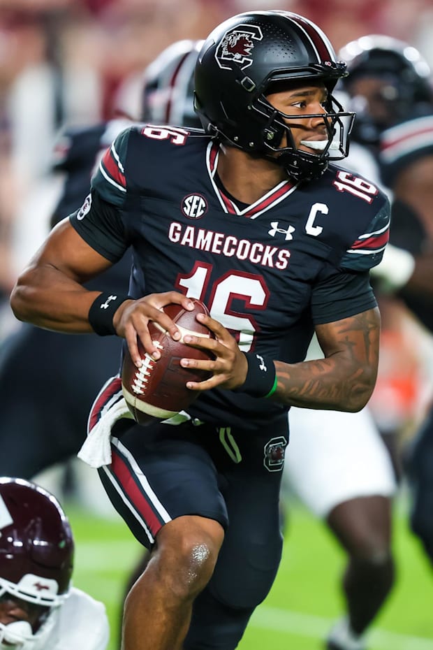 South Carolina Gamecocks quarterback LaNorris Sellers (16) scrambles against the Texas A&M Aggies in the first quarter.
