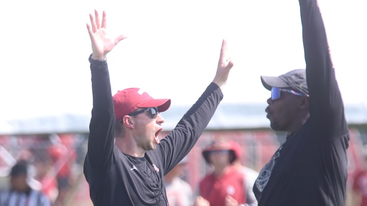 Oklahoma coach Doug Deakin (left)