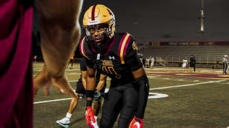 Rylon Dillard-Allen gets ready for game night at Mountain Pointe High in Phoenix. 