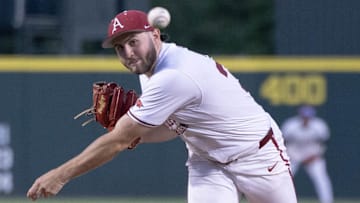 Arkansas Razorbacks pitcher Zach Root throws a pitch against the Texas Longhorns. The Razorbacks blanked the Longhorns 9-0 in the series opener.
