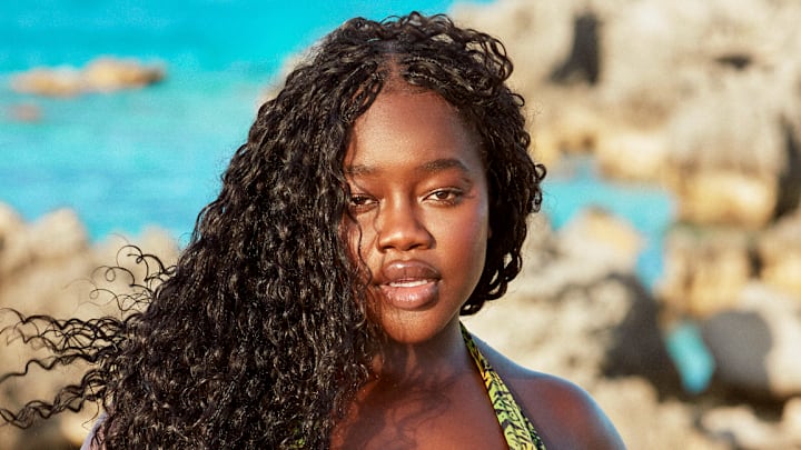 Achieng Agutu was photographed by Ben Watts in Bermuda. Swimsuit by Camila Coelho.