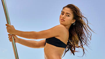 Rayna Vallandingham was photographed by Yu Tsai in Jamaica. Swimsuit by Andi Bagus. Necklace by Ben-Amun.