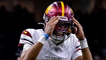 Dec 15, 2024; New Orleans, Louisiana, USA;  Washington Commanders quarterback Jayden Daniels (5) Mandatory Credit: Stephen Lew-Imagn Images