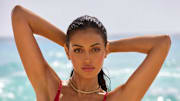 Cindy Kimberly was photographed by Ben Watts in Barbados. Necklaces by Electric Picks.