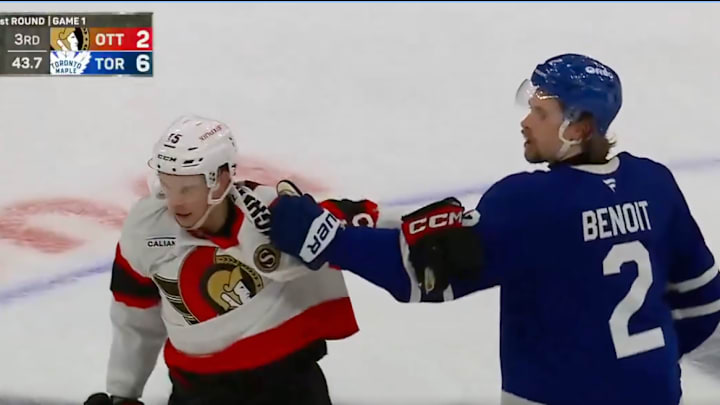 Maple Leafs defender Simon Benoit grabs Ottawa Senators forward Matthew Highmore late into Game 1 of their 2025 NHL Stanley Cup Playoffs series. Maple Leafs defender Simon Benoit grabs Ottawa Senators forward Matthew Highmore late into Game 1 of their 2025 NHL Stanley Cup Playoffs series.
