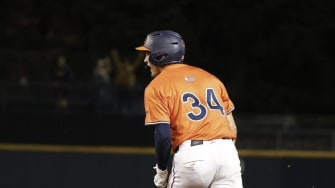 Harrison Didawick rounds the bases after hitting a walk-off home run to end the Virginia baseball game against Virginia Tech.