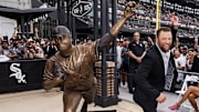 Chicago White Sox pitcher Mark Buehrle poses next to his statue, which was unveiled Friday at Rate Field.