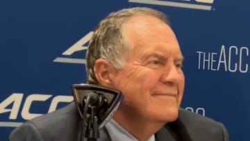 UNC football coach Bill Belichick speaking with media members at ACC Kickoff, the league's preseason media days, on July 24 in Charlotte.