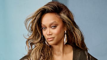 Tyra Banks was photographed by Yu Tsai in Hollywood, Fla. Dress by Mac Duggal. Jewelry by Charlie Lapson. 