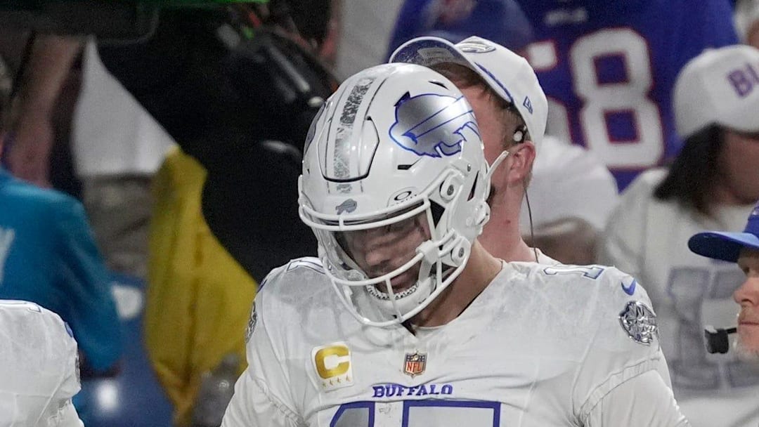 Buffalo Bills quarterback Mitchell Trubisky and Buffalo Bills quarterback Josh Allen react to the Patriots field goal