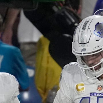 Buffalo Bills quarterback Mitchell Trubisky and Buffalo Bills quarterback Josh Allen react to the Patriots field goal